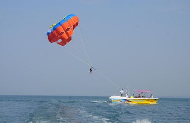 Have Fun and Laughs on a Parasailing Ride in Malvan, India