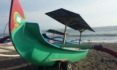 Enjoy Mengwi, Bali on This Green Colour Traditional Boat