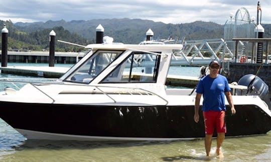 Enjoy Fishing in Tairua, New Zealand on 24' Strikezone Cuddy Cabin