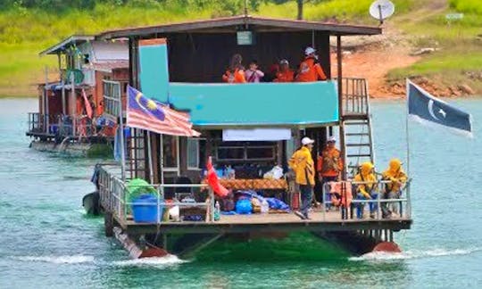 See Wildlife and Waterfalls on a Houseboat Charter in Malaysia