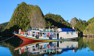 Liveaboard rental for diving and snorkeling in Raja Ampat, Indonesia.