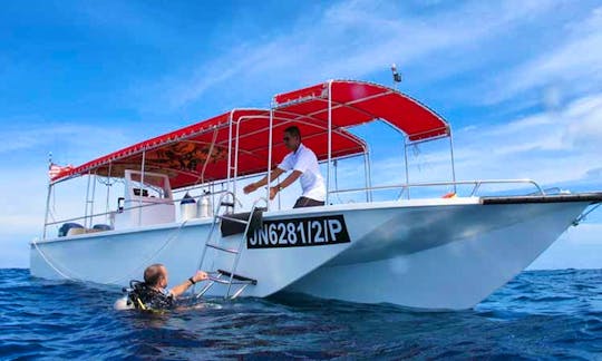 Tri-Maran 32' long with great features and space for those scuba diving trips in Malaysia or Sabah.