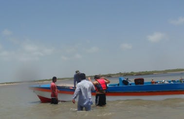 Take 12 people out for a fantastic boat trip in Karachi, Pakistan