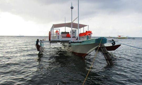 Charter a Traditional Boat in Dauin, Philippines