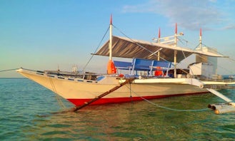 Charter a Traditional Pinoy Boat to Cruise the Mindoro Strait, Philippines