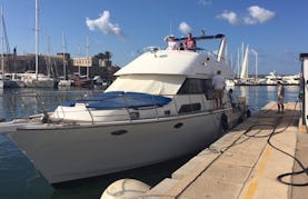 Experience the Turquoise Waters By Motor Yacht in Alghero