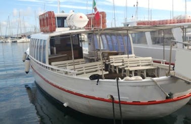 "M / N Punta Giglio" Motorboat Trips in Alghero