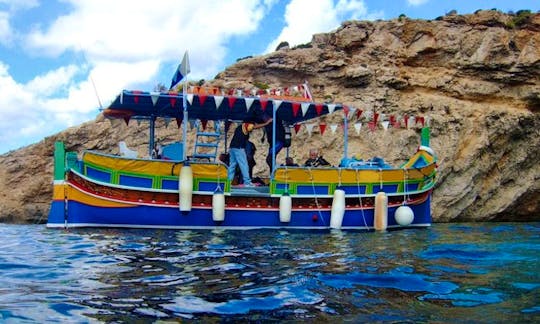 Charter a Luzzu Traditional Boat in Buġibba, Malta