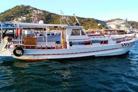 Captained Power Boat for 40 People in Arraial do Cabo, Brazil