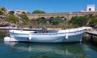 Journey out and explore Leuca's caves by boat