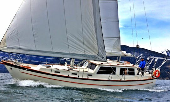 Experience the Wildness of the Great Bear Rainforest from our Spacious Pilothouse Sailboat Classic 39ft Cooper "Seawolf"