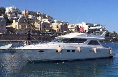 Enjoy With Friends And Family On This 12 Persons Motor Yacht Charter in San Pawl il-Baħar, Malta