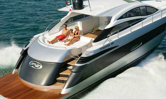 Cruise along the coast of Mikonos, Greece with this 56' Pershing Power Mega Yacht