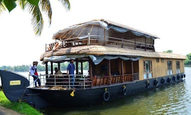 Experience this 6 Person Houseboat to Cruise the Backwater of Kerala