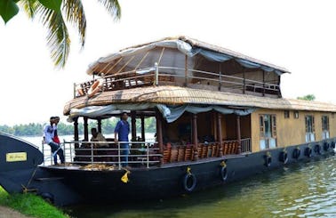 Experience this 6 Person Houseboat to Cruise the Backwater of Kerala