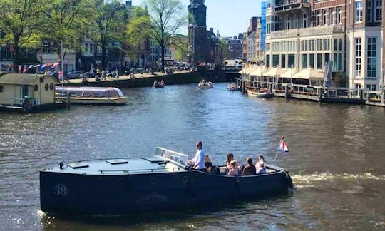 Charter a Canal Boat with up to 12 people in Amsterdam