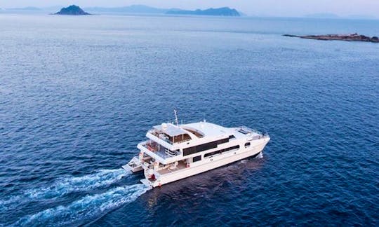 Charter this astonishing 118' Solitude Adventurer Power Catamaran to explore Indonesia