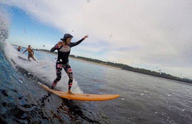 Get thrilling surfing experience in Denpasar, Bali