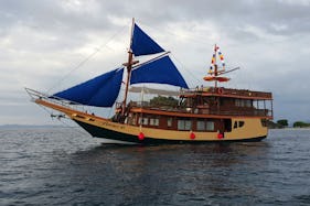 Explore Barat, Indonesia with family and friends aboard this 89' traditional phinisi boat