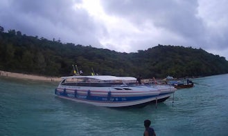 Discover Phi Phi Island in Thailand aboard a 35 people cuddy cabin