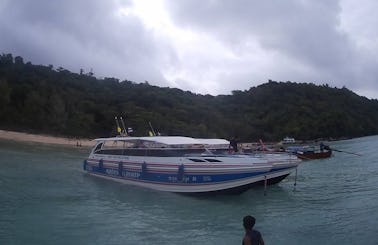 Discover Phi Phi Island in Thailand aboard a 35 people cuddy cabin