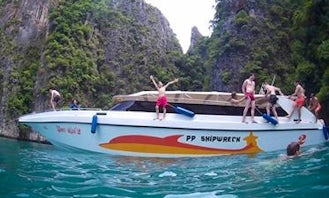 Enjoy the experience of sightseeing on cuddy cabin around this lovely Phi Phi island