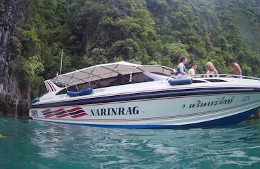 Explore Phi Phi Island with family and friends aboard this 25 people cuddy cabin