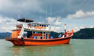 Have an amazing fishing experience in Satun, Thailand on Traditional Trawler
