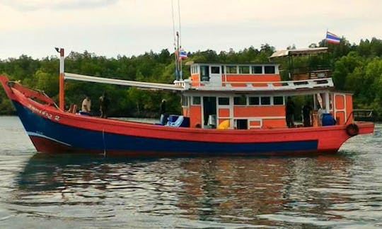 Have an amazing fishing experience in Satun, Thailand on Traditional Trawler