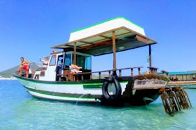 Explore the beaches of Arraial do Cabo, Brazil on this amazing Trawler Boat!