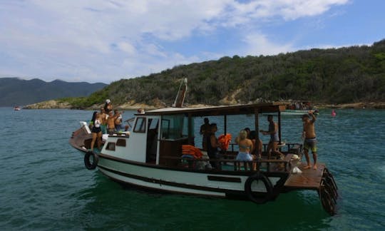 Explore the beaches of Arraial do Cabo, Brazil on this amazing Trawler Boat!