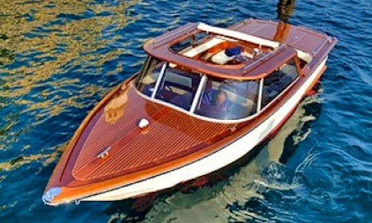Exciting Boat Ride with a Venetian style boat, Italy!