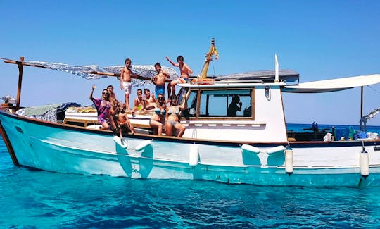 Private Charter On-board a 43 ft Trawler for 12 People in Formentera, Spain