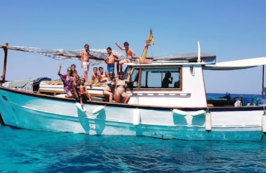 Private Charter On-board a 43 ft Trawler for 12 People in Formentera, Spain