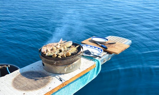 grilling fresh fish at sea