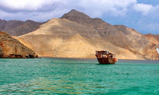 Traditional Omani Dhow Boat Cruises on the Historical Telegraphic Island