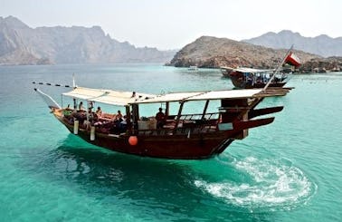 Traditional Omani Dhow Boat Cruises on the Historical Telegraphic Island