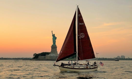 Sail NYC's skyline aboard the Genesis, a beautiful classic sailboat!