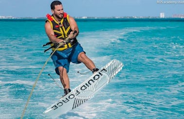 Wakeboarding in Cancún, Mexico on a SeaRay Sundeck boat