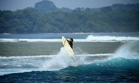 Learn Surfing with Hapiness at Carita Beach in Indonesia