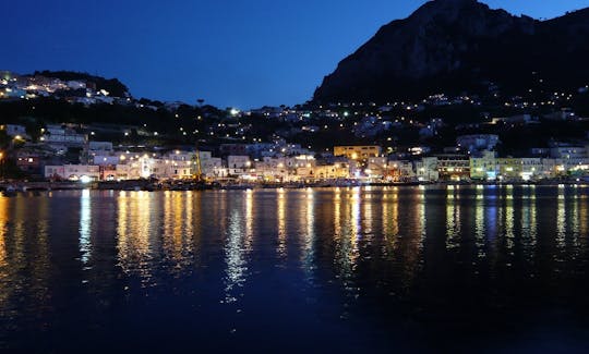 Reserve uma noite romântica a bordo em Positano, Campania!