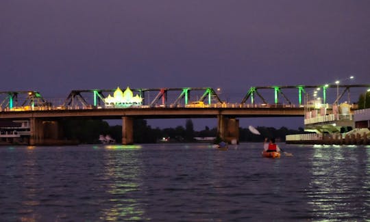 Night Kayaking at the Bridge, MaeKlong river, Ratchaburi province, Thailand