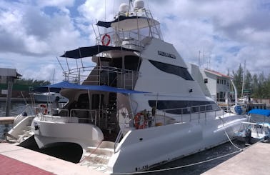 Charter the Multimillionaire 74' VIP Luxury Bolder boat Power Catamaran  optional: JetSki Scooter Snorkel Paddleboard