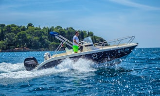 Explore Rovinj with Fisher 20 Powerboat with 150 hp Outboard Motor