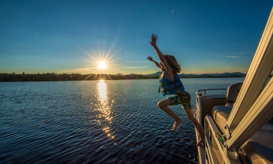 Swim from our pontoon on one of NH' most pristine lakes