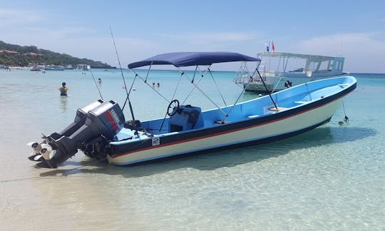 Viaje de pesca en alta mar en Roatán, Islas De La Bahía con el Capitán Lewis y Keaton