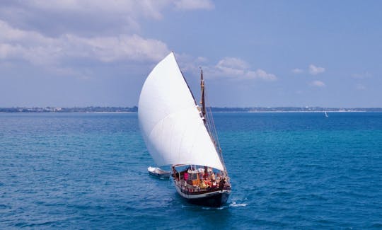 Luxury 60 foot Traditional Dhow sailing off Stone Town, Zanzibar Archipelago