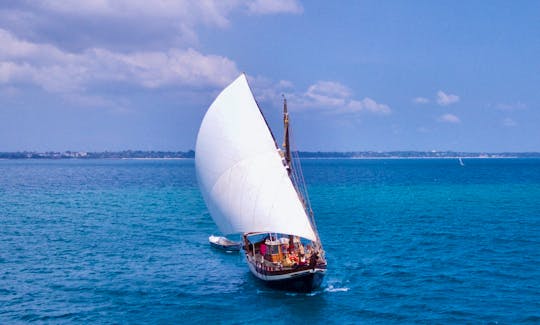 Luxury 60 foot Traditional Dhow sailing off Stone Town, Zanzibar Archipelago