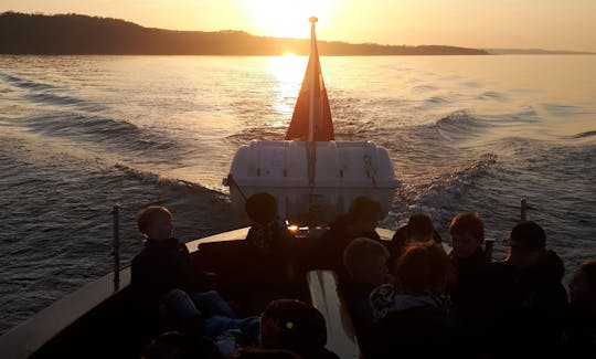 Passeios de barco pela ilha em Gudhjem