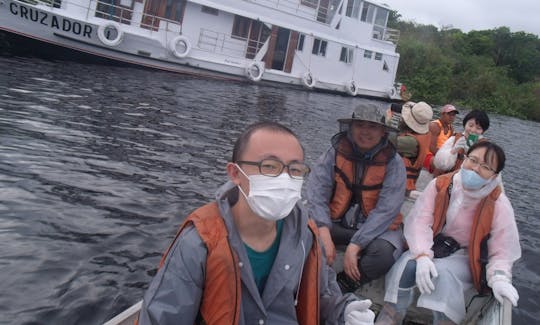 GOING ON A TOUR IN A MOTORIZED BOAT.